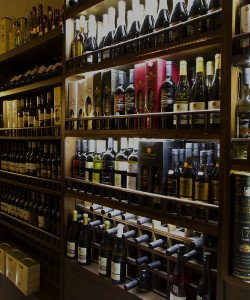 Liquor stores, bottles of wine in a shelf rack